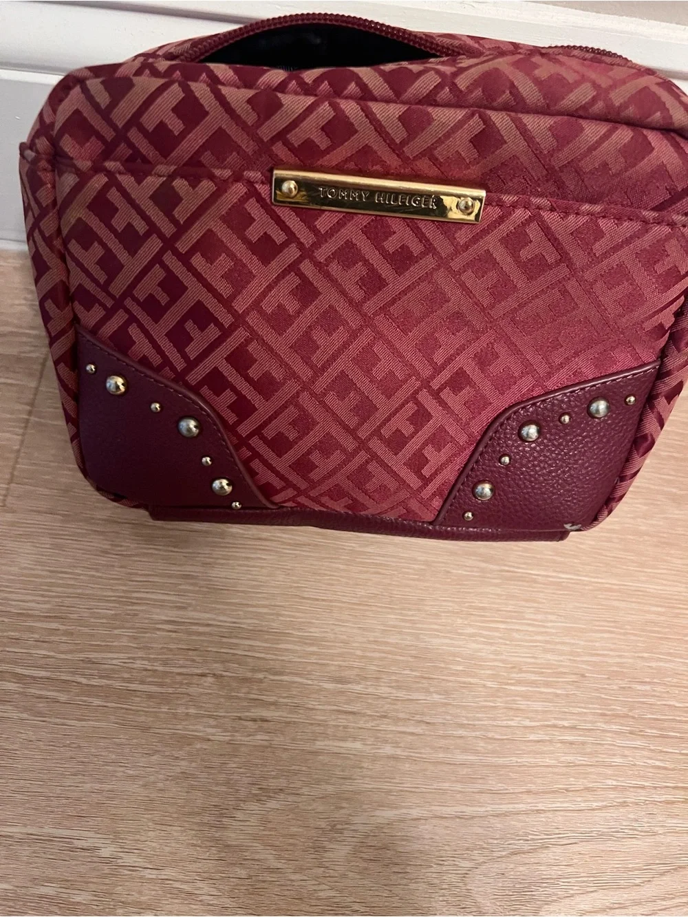 Tommy Hilfiger Burgundy Monogram Camera bag with Gold Plate
